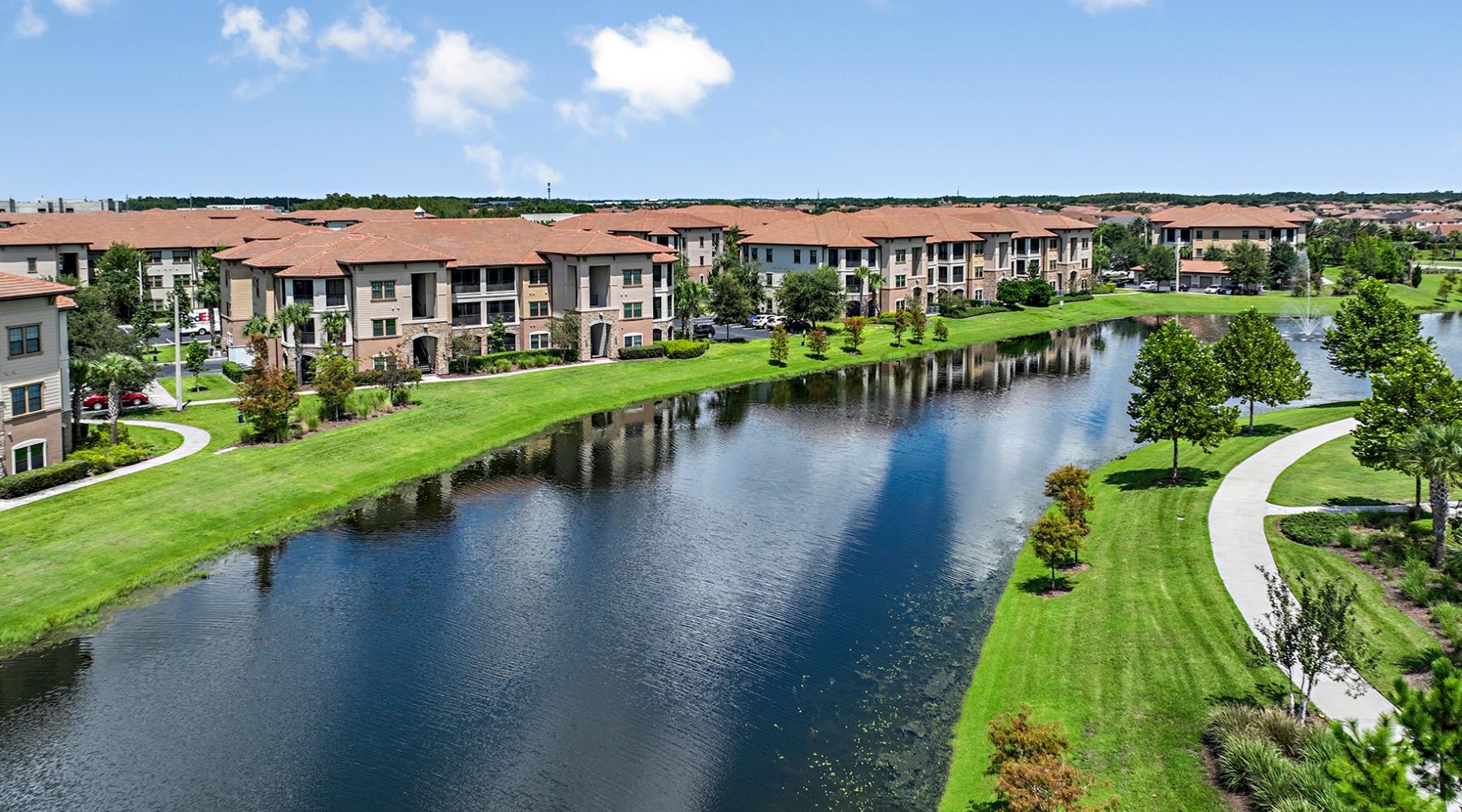 a body of water with buildings along it