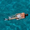 woman swimming in pool