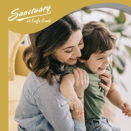 a woman holding a child