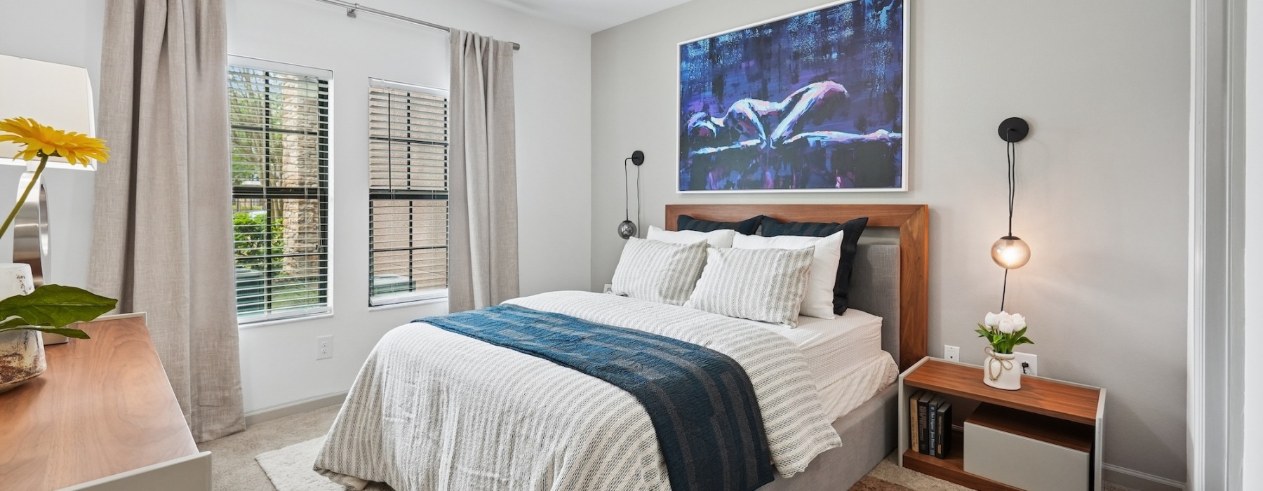 Bedroom with natural lighting and high ceilings